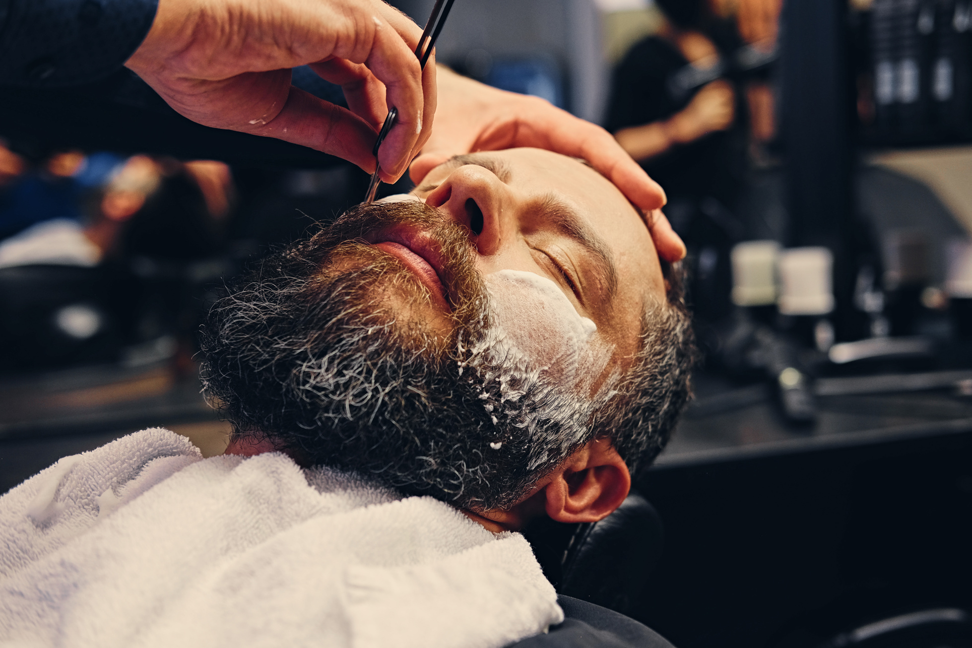 Barber Shaving Bearded Male